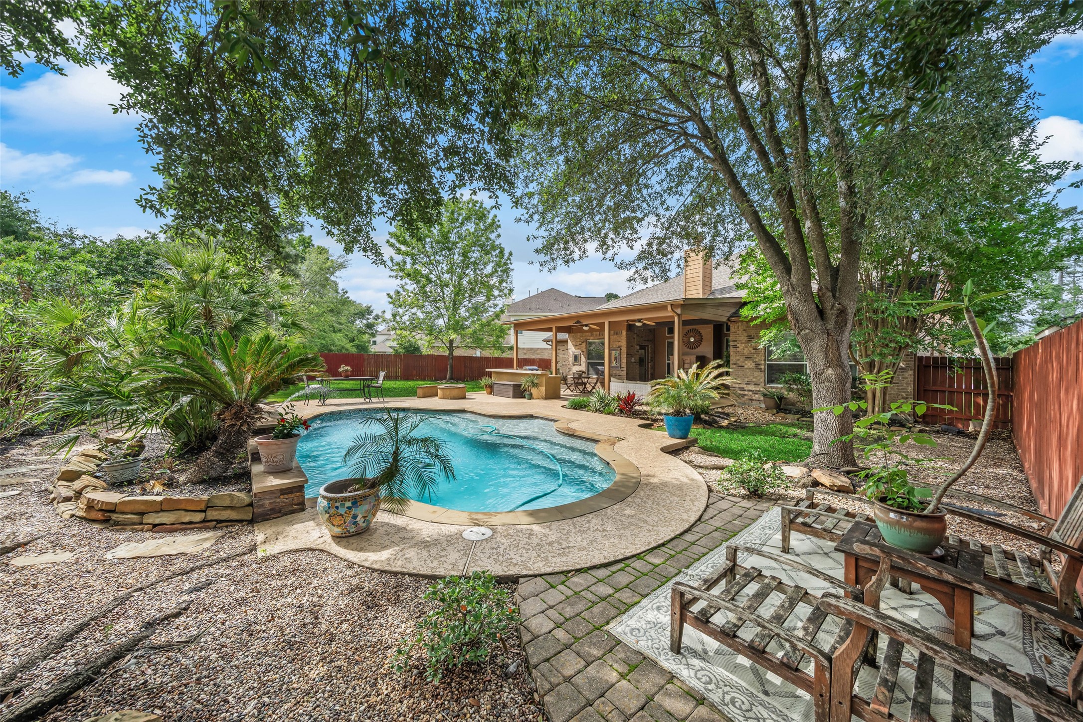 6407 Ashley Manor Drive Spring, TX 77389 - Photo 37 of 41 a view of a house with backyard and sitting area