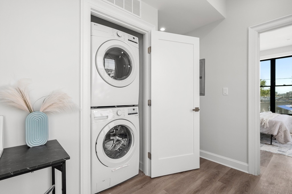 523 2nd Street, Unit 303 Everett, MA 02149 - Photo 11 of 11 a utility room with dryer and washer