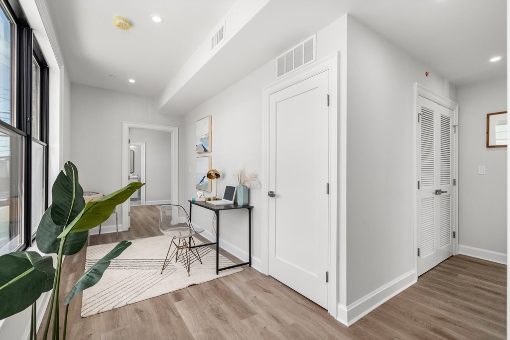 523 2nd Street, Unit 303 Everett, MA 02149 - Photo 5 of 11 a living room with furniture