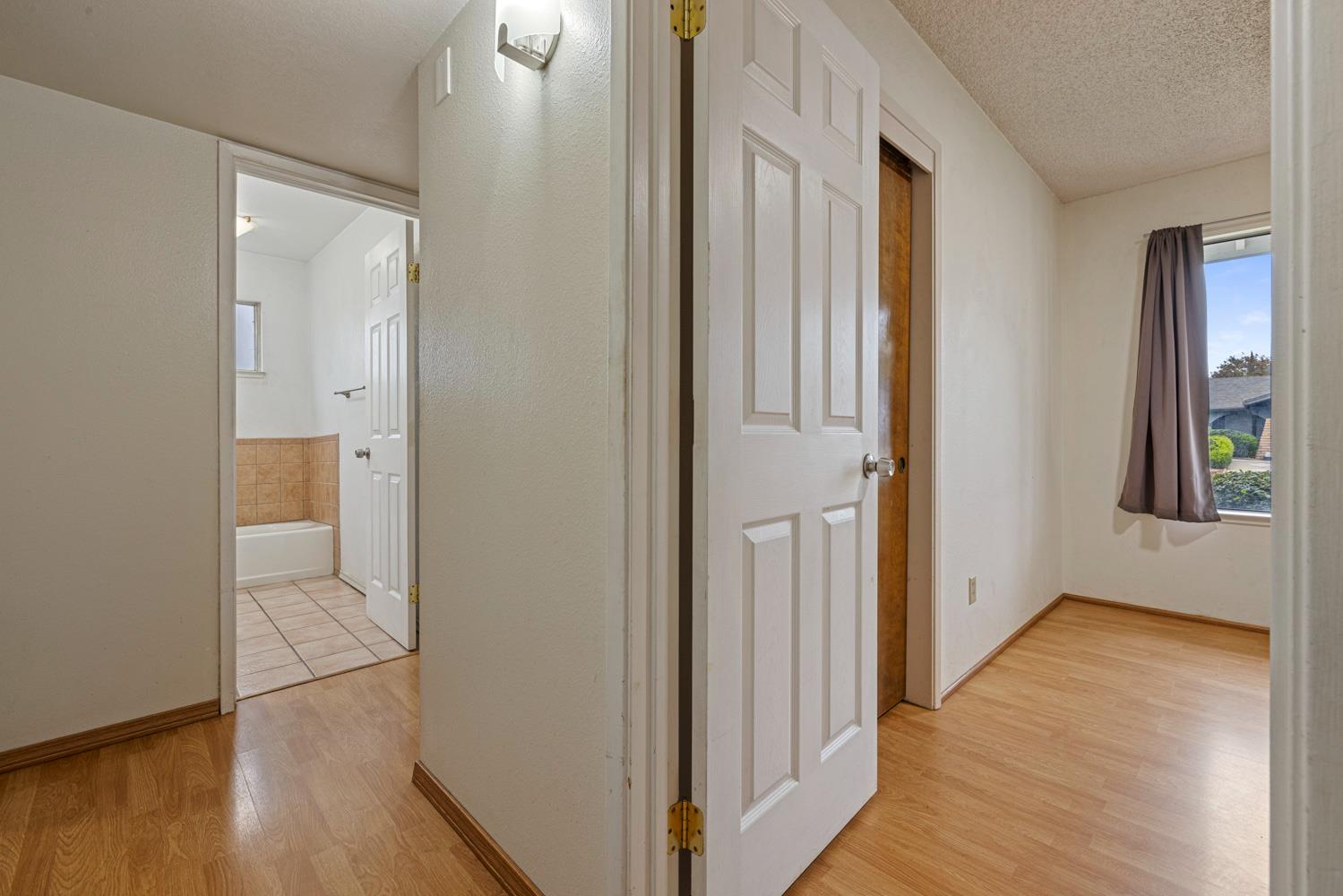1205 Kara Lane Modesto, CA 95355 - Photo 23 of 39 a view of entryway with wooden floor