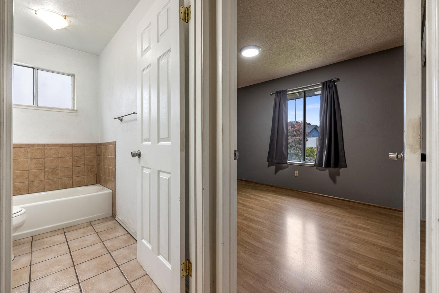 1205 Kara Lane Modesto, CA 95355 - Photo 31 of 39 a view of a bathroom with bathtub and shower