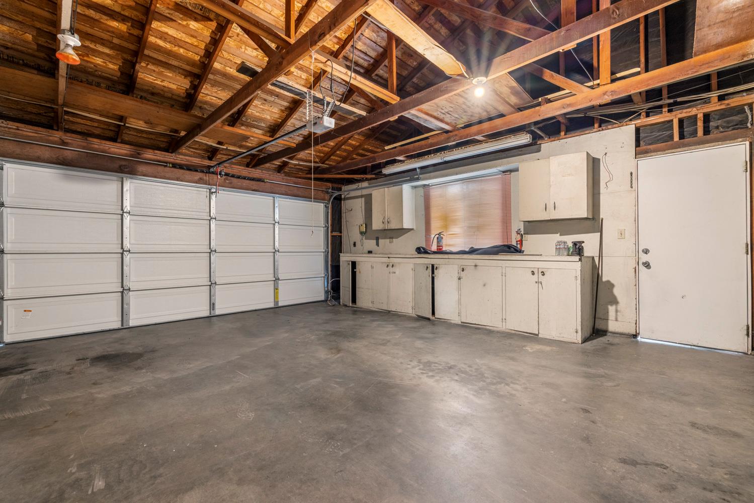 1205 Kara Lane Modesto, CA 95355 - Photo 34 of 39 a view of a utility room with cabinets