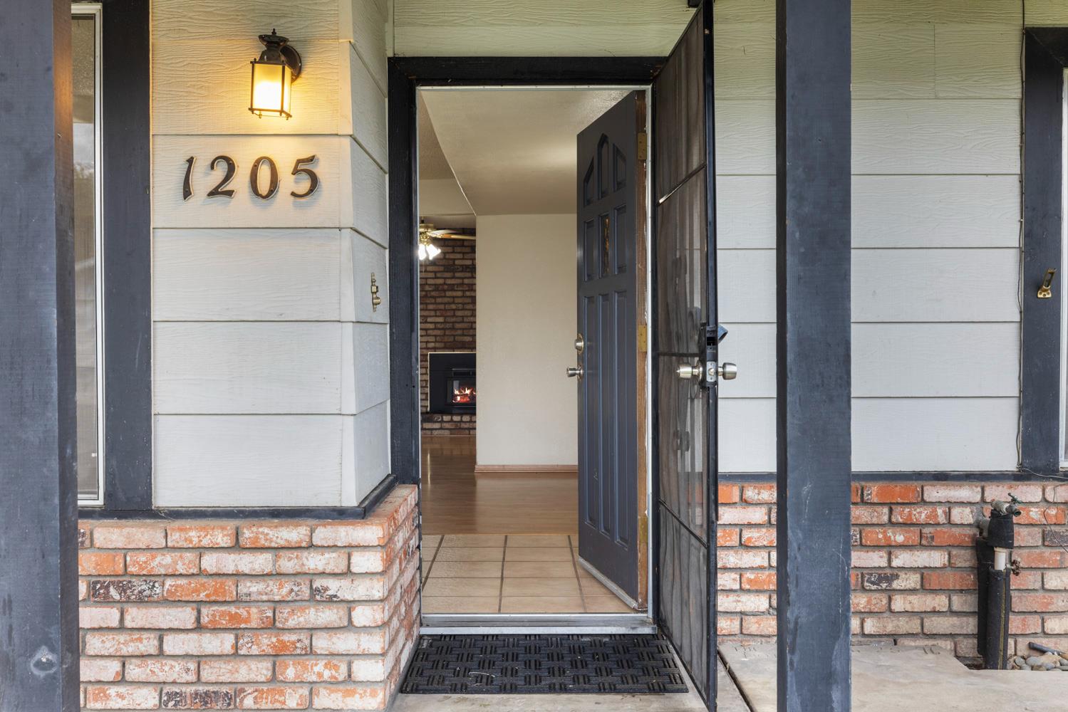 1205 Kara Lane Modesto, CA 95355 - Photo 5 of 39 a view of a door and the street