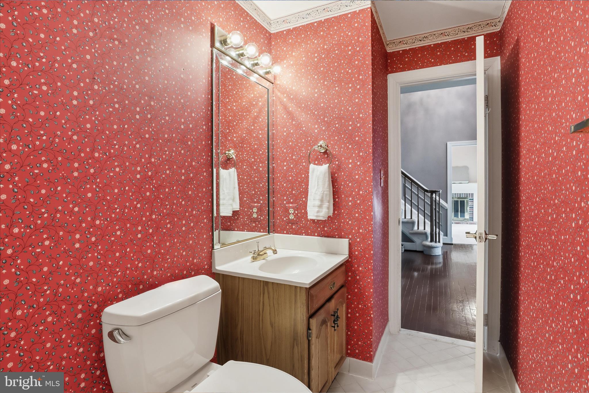 6809 Spout Lane Fairfax Station, VA 22039 - Photo 24 of 81 a bathroom with a sink a toilet and shower