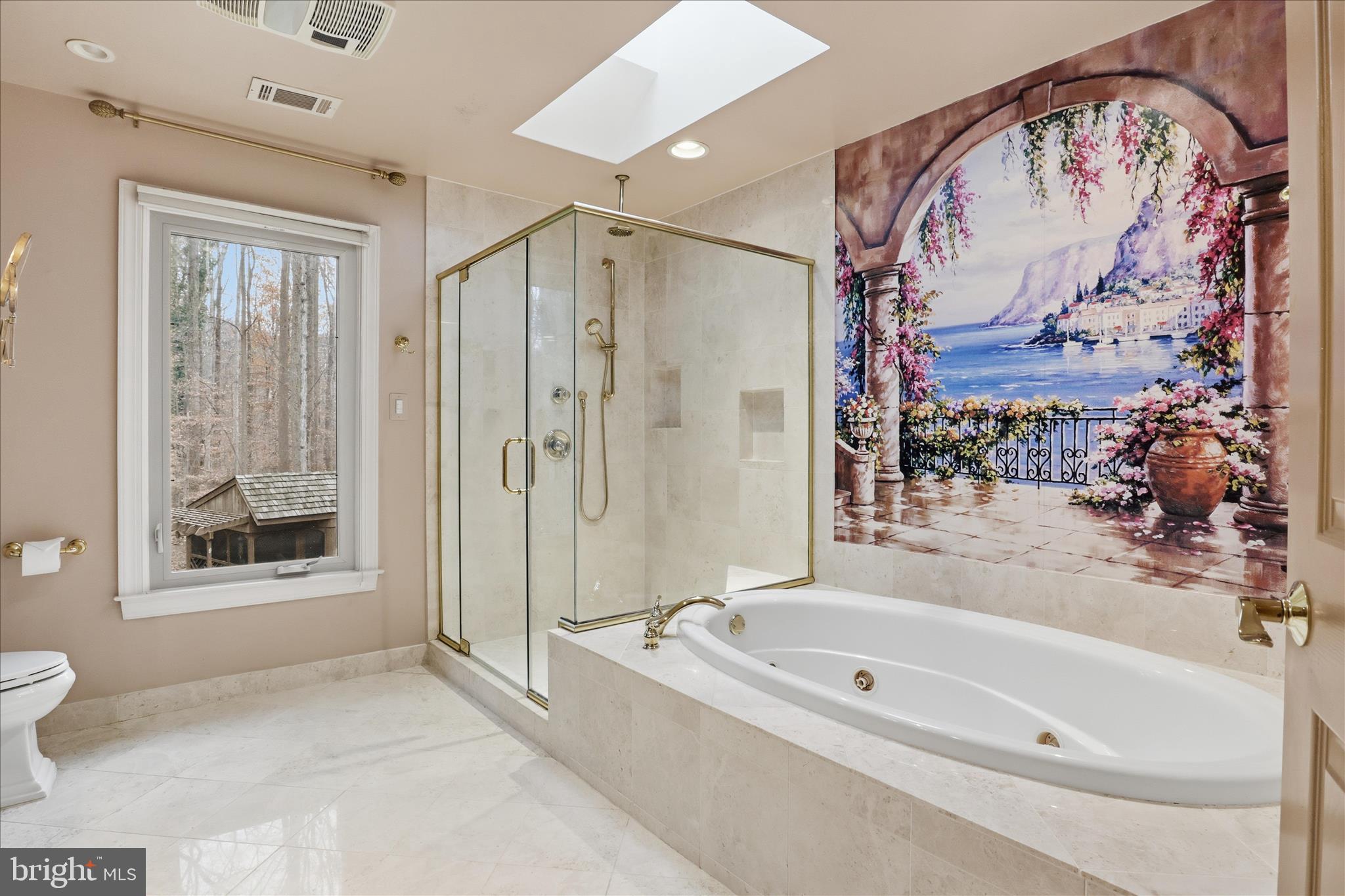 6809 Spout Lane Fairfax Station, VA 22039 - Photo 28 of 81 a bathroom with a bathtub and a shower