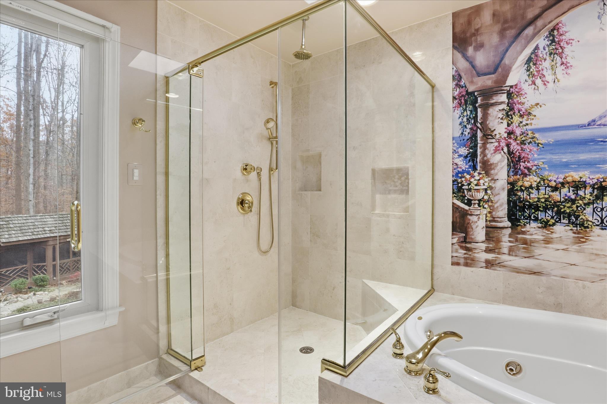 6809 Spout Lane Fairfax Station, VA 22039 - Photo 29 of 81 a bathroom with a shower and a bath tub