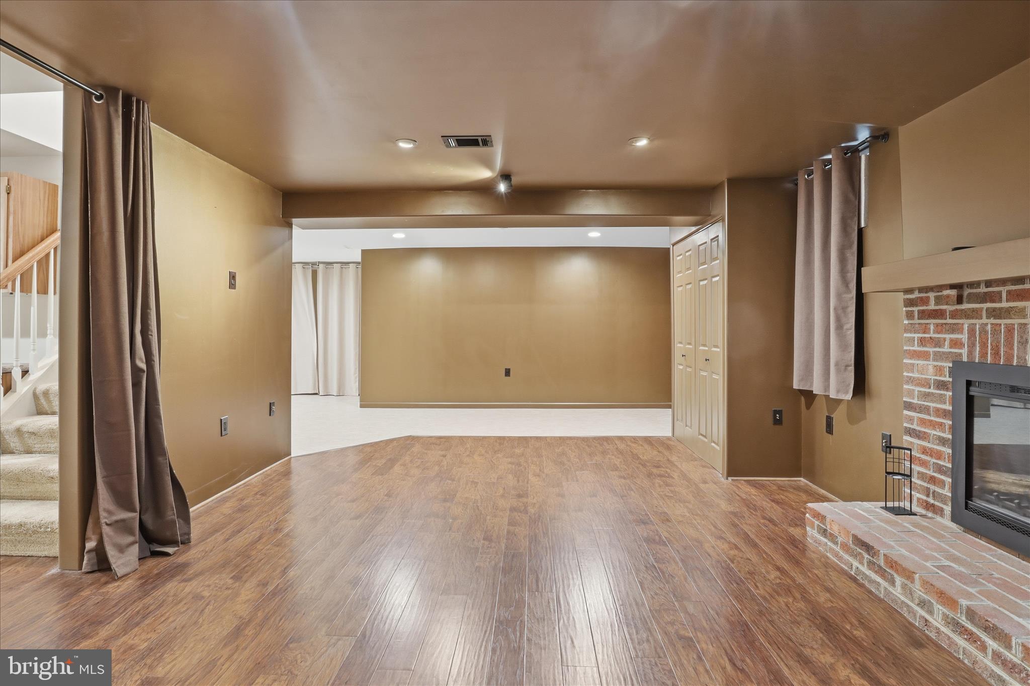 6809 Spout Lane Fairfax Station, VA 22039 - Photo 37 of 81 a view of empty room with wooden floor and fan