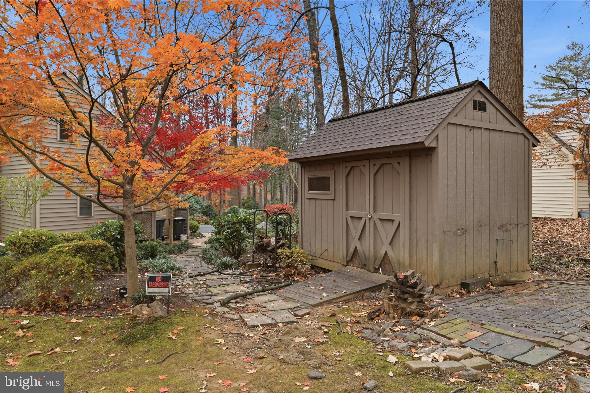 6809 Spout Lane Fairfax Station, VA 22039 - Photo 51 of 81 a view of a house with a small yard and sitting area