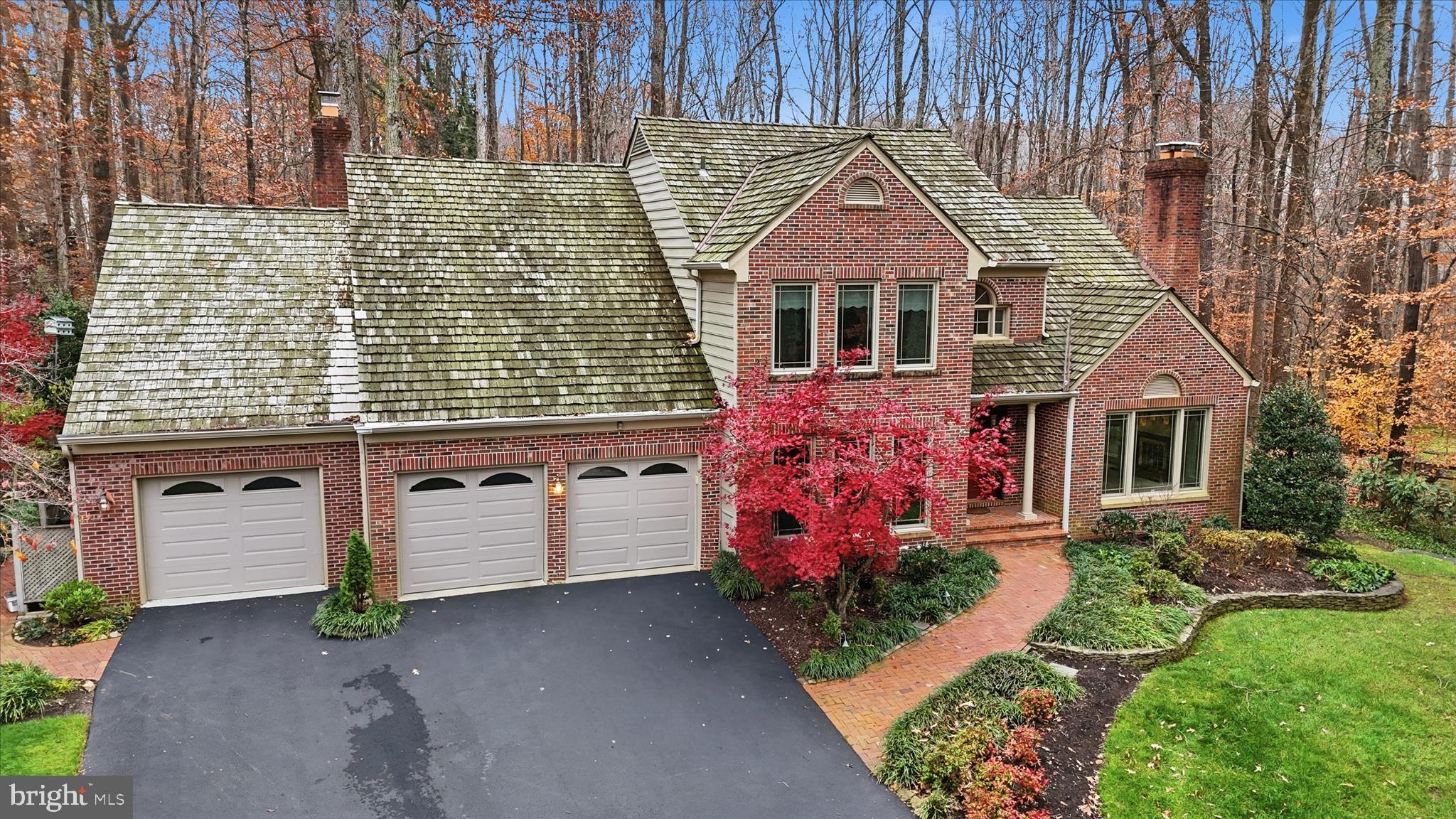6809 Spout Lane Fairfax Station, VA 22039 - Photo 8 of 81 front view of a house with a yard