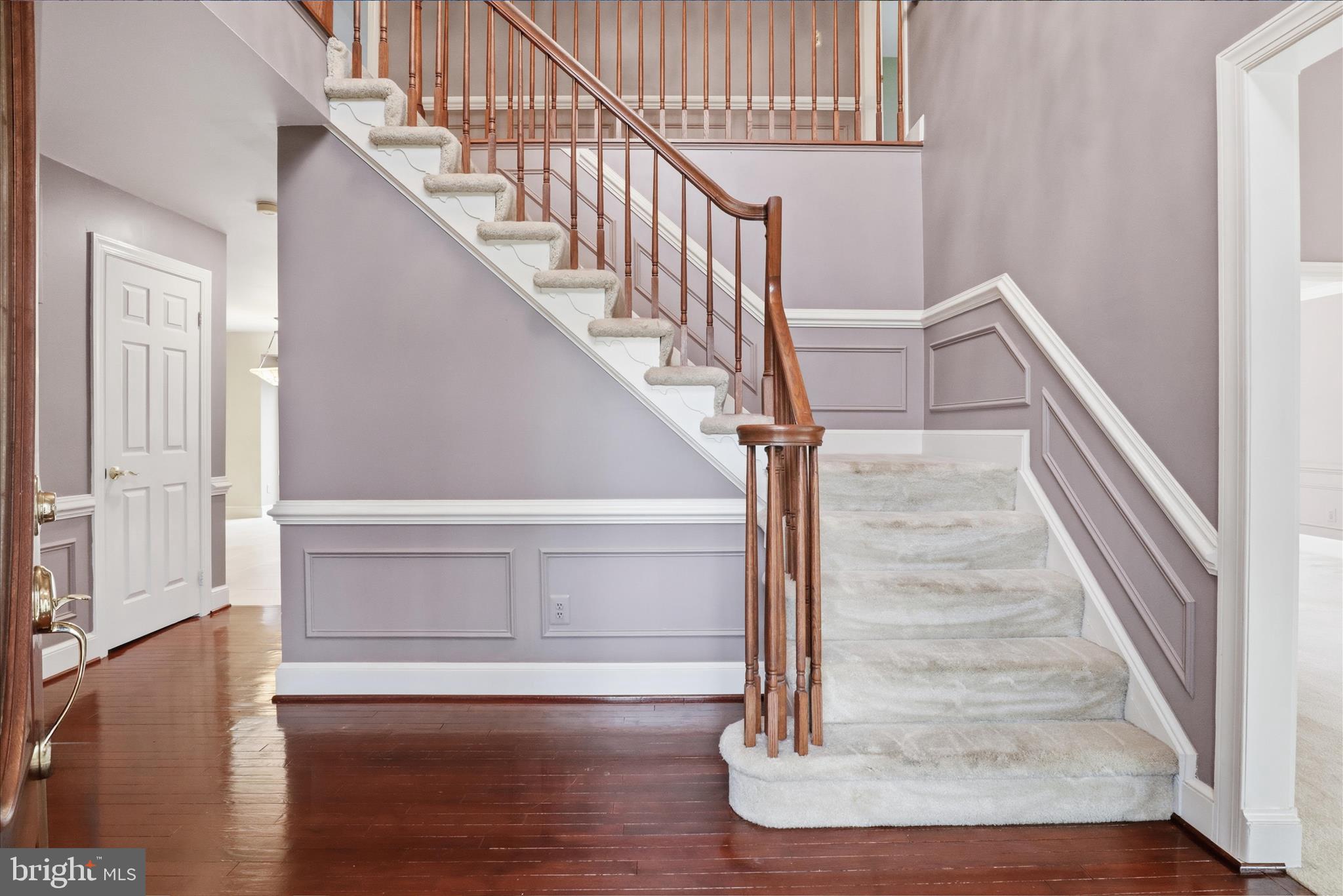 6809 Spout Lane Fairfax Station, VA 22039 - Photo 10 of 81 a view of entryway and hall with wooden floor
