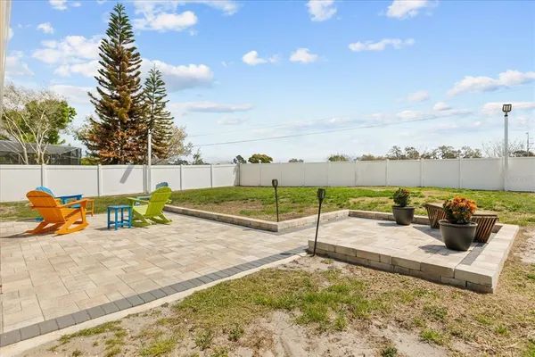 a view of a terrace with chairs