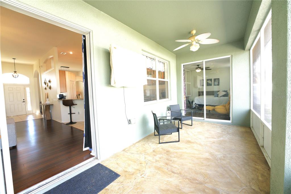 2309 Wolf Ridge Lane Mount Dora, FL 32757 - Photo 48 of 62 a view of a livingroom with furniture and hardwood floor