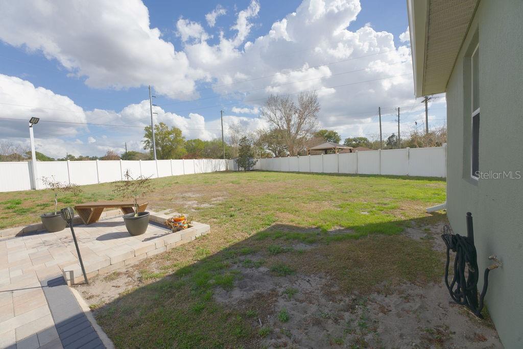 2309 Wolf Ridge Lane Mount Dora, FL 32757 - Photo 50 of 62 a view of an outdoor space and swimming pool