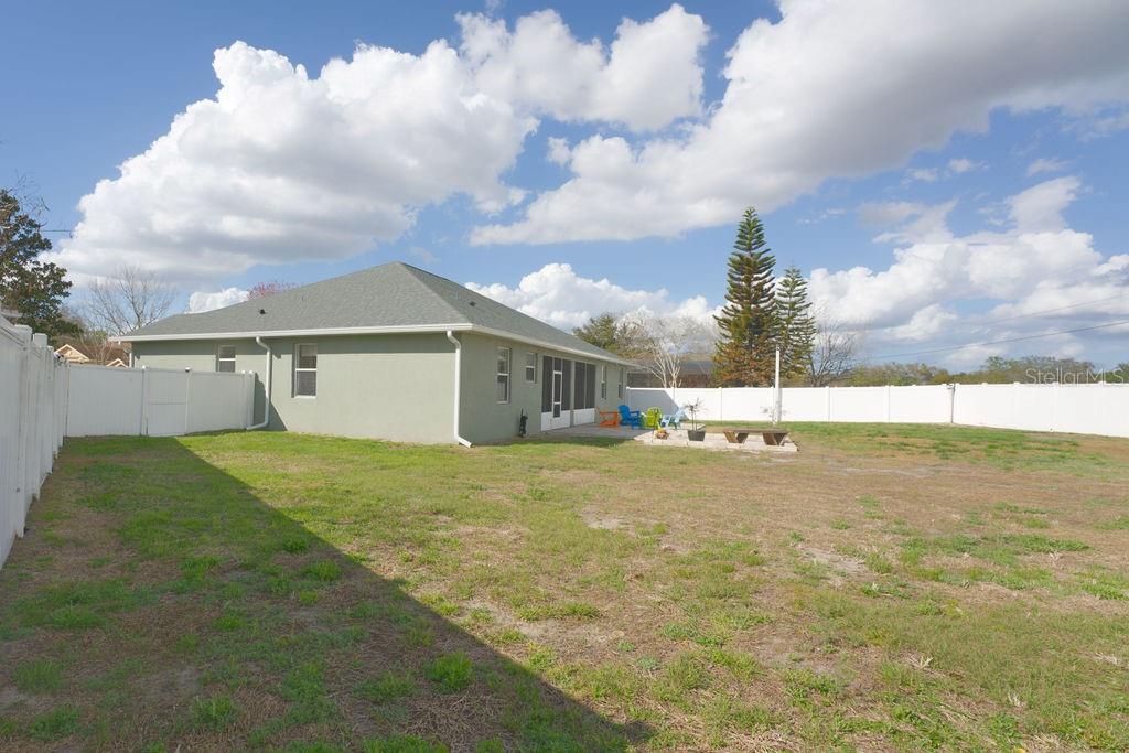 2309 Wolf Ridge Lane Mount Dora, FL 32757 - Photo 57 of 62 a front view of house with yard and entertaining space