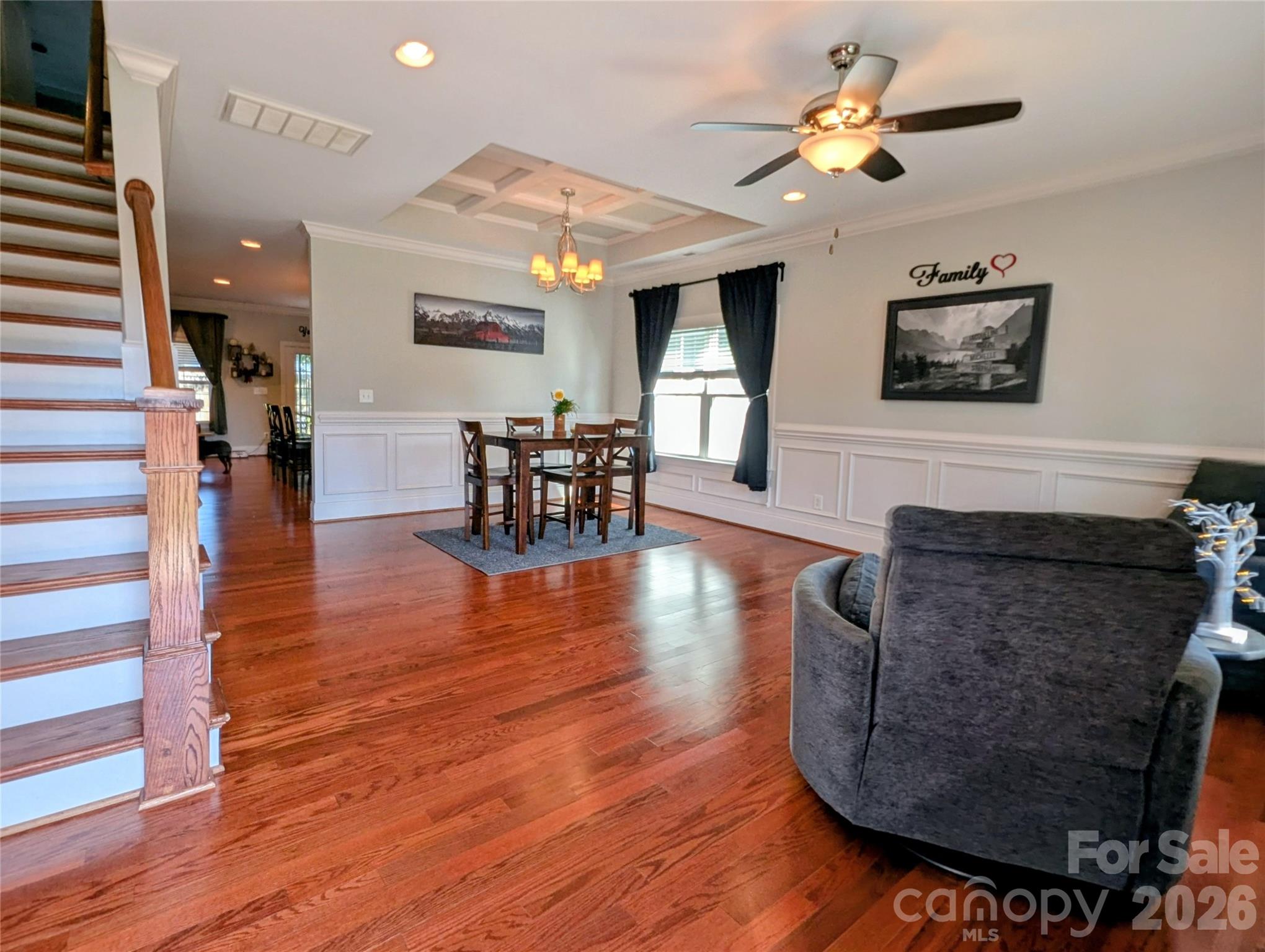 19934 Walter Henderson Road Cornelius, NC 28031 - Photo 3 of 35 a living room with furniture and a wooden floor