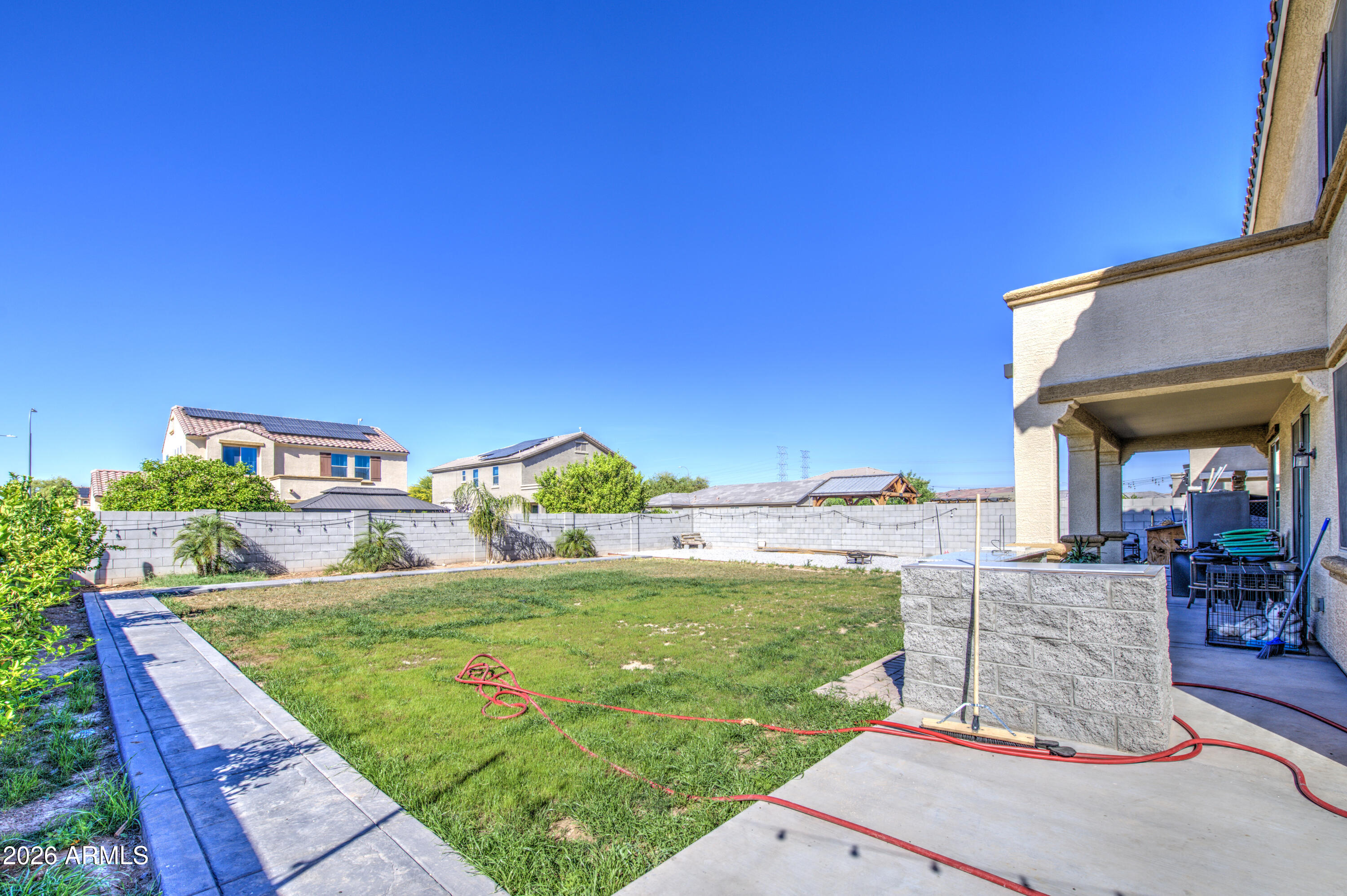 12202 West Del Rio Lane Avondale, AZ 85323 - Photo 49 of 49 a view of a house with a yard porch and sitting area