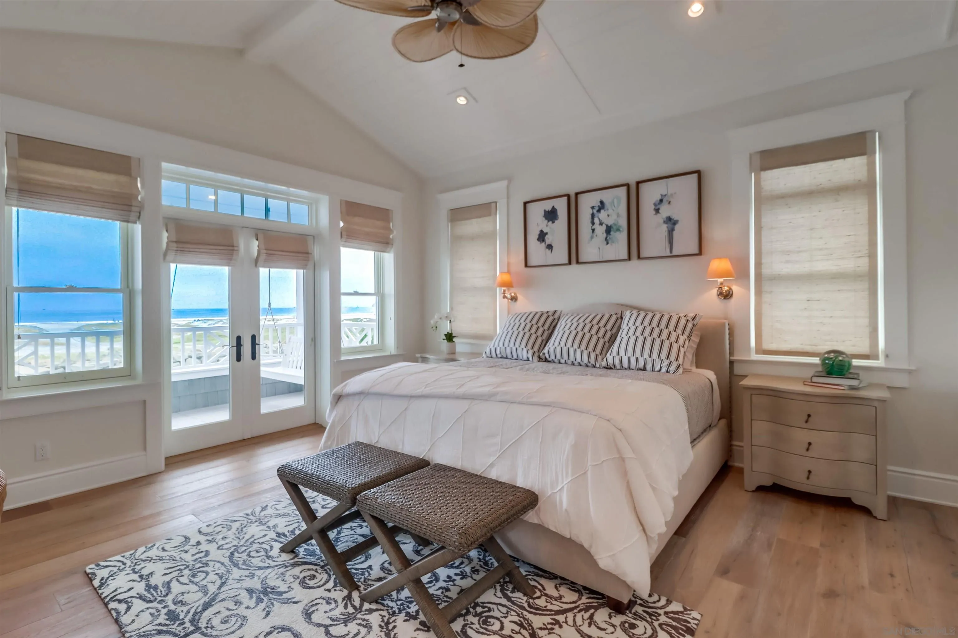 441 Ocean Boulevard Coronado, CA 92118 - Photo 14 of 40 a bedroom with a large bed and a window