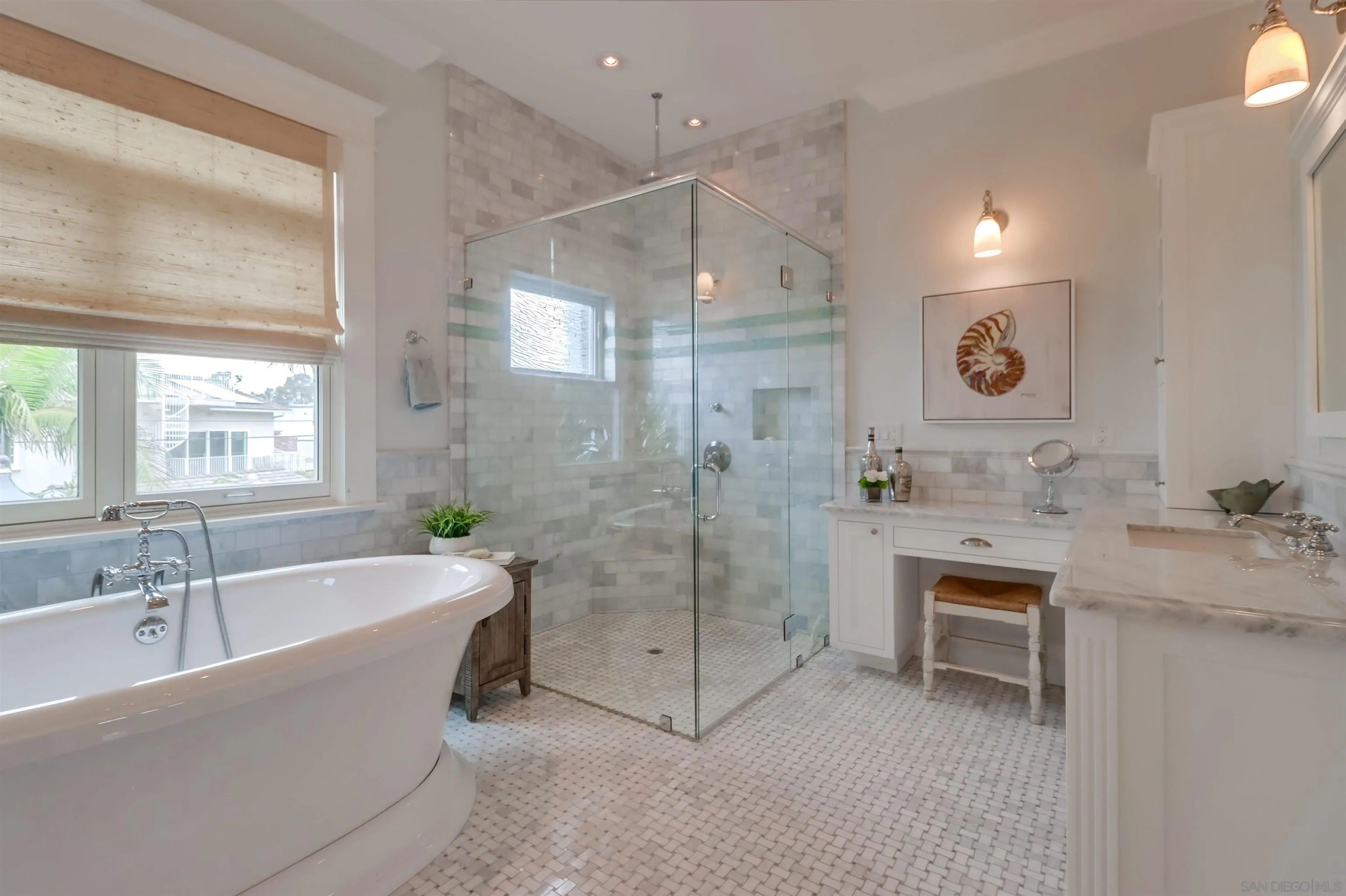 441 Ocean Boulevard Coronado, CA 92118 - Photo 18 of 40 a spacious bathroom with a bathtub shower sink and mirror