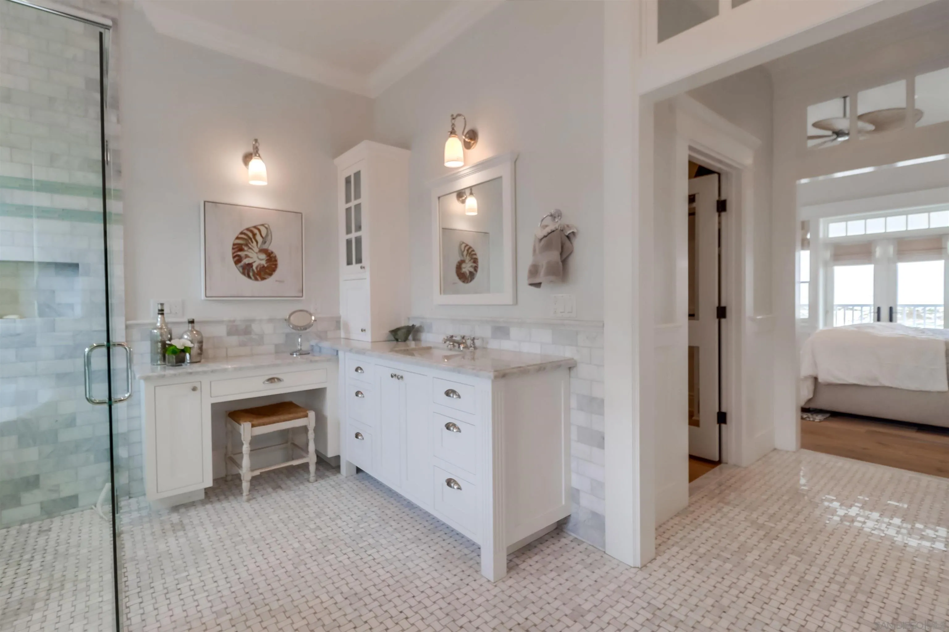 441 Ocean Boulevard Coronado, CA 92118 - Photo 19 of 40 a spacious bathroom with a double vanity sink and a mirror