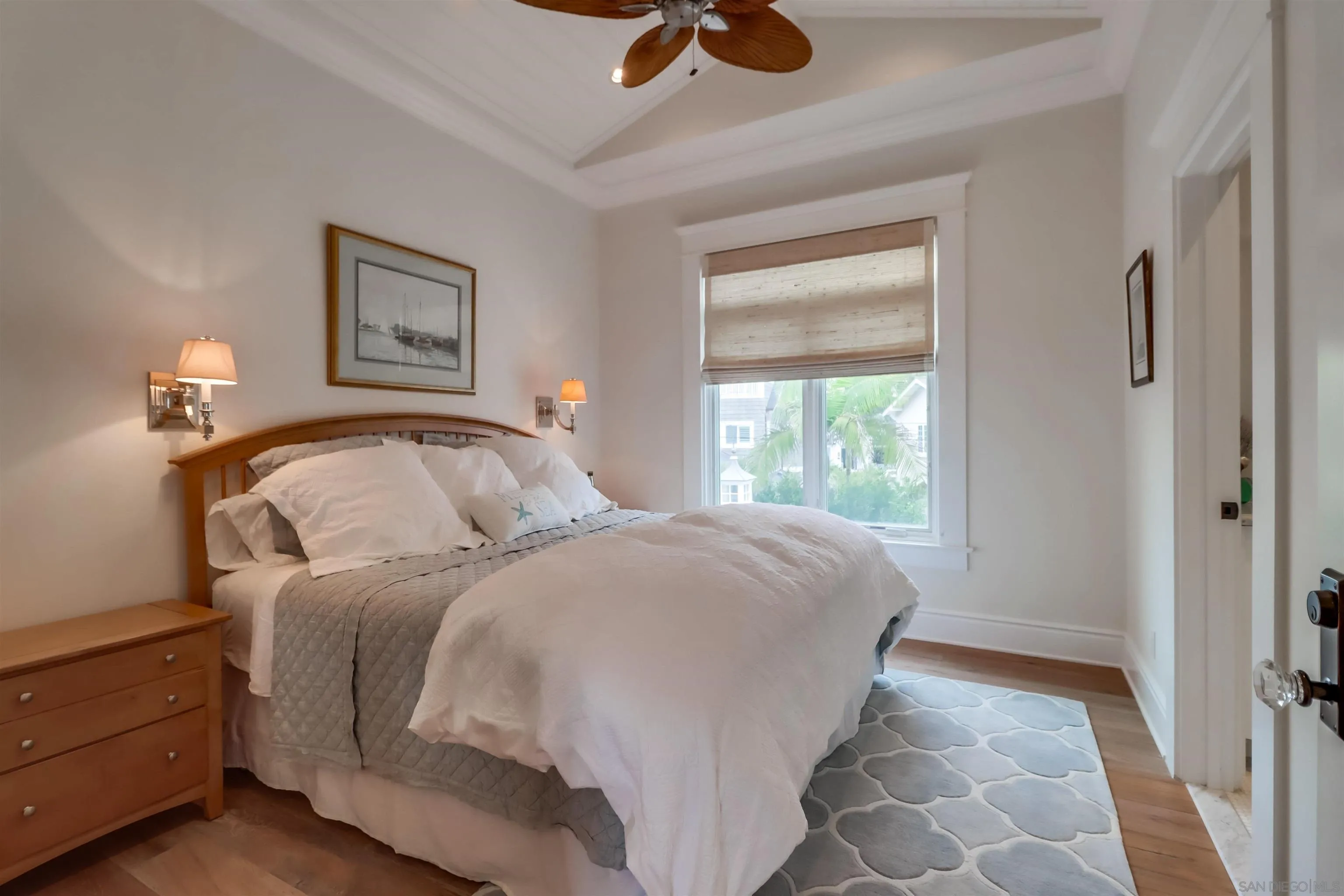 441 Ocean Boulevard Coronado, CA 92118 - Photo 29 of 40 a bedroom with a bed and a window