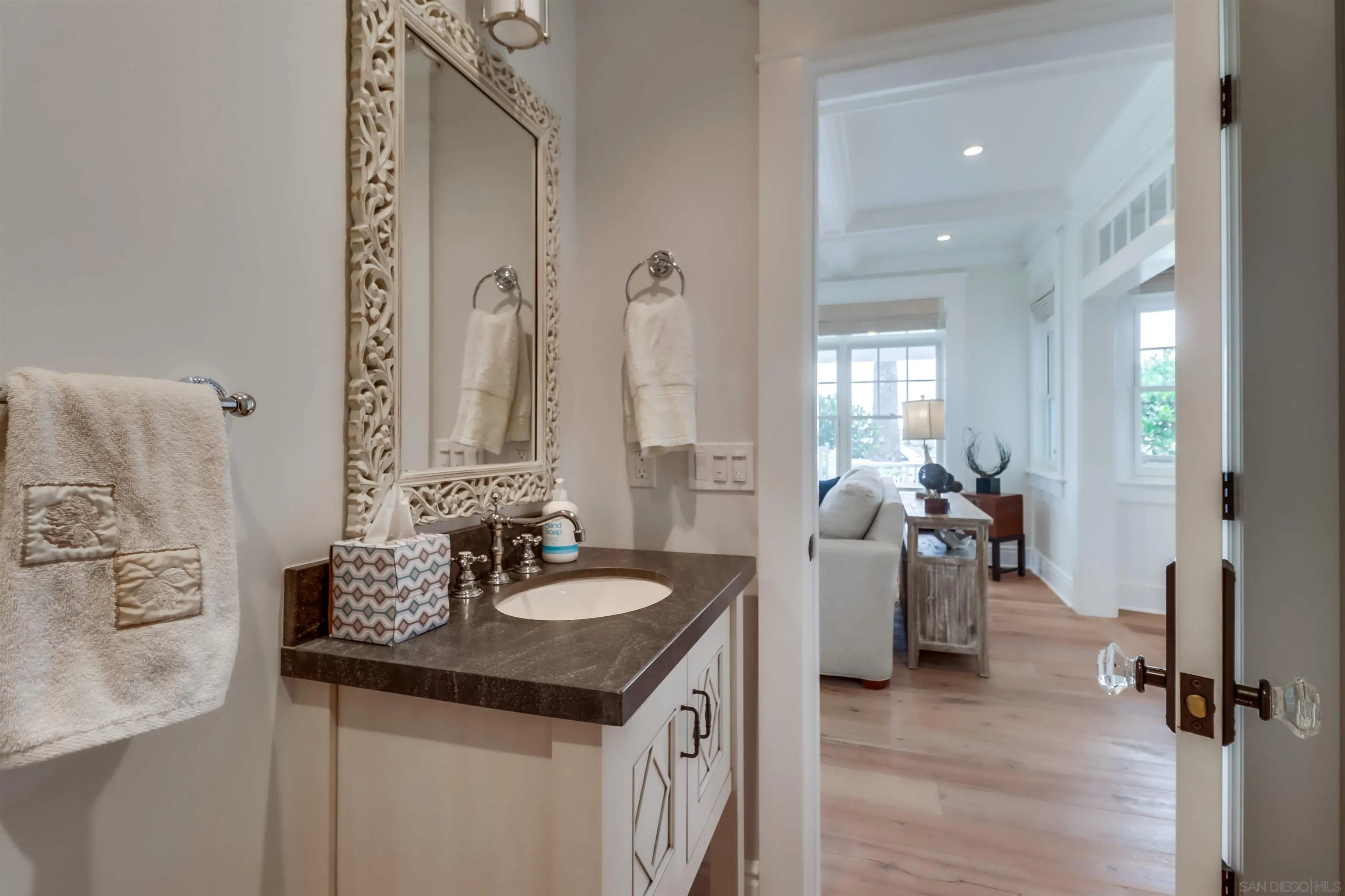 441 Ocean Boulevard Coronado, CA 92118 - Photo 30 of 40 a view of living room with granite countertop furniture and wooden floor
