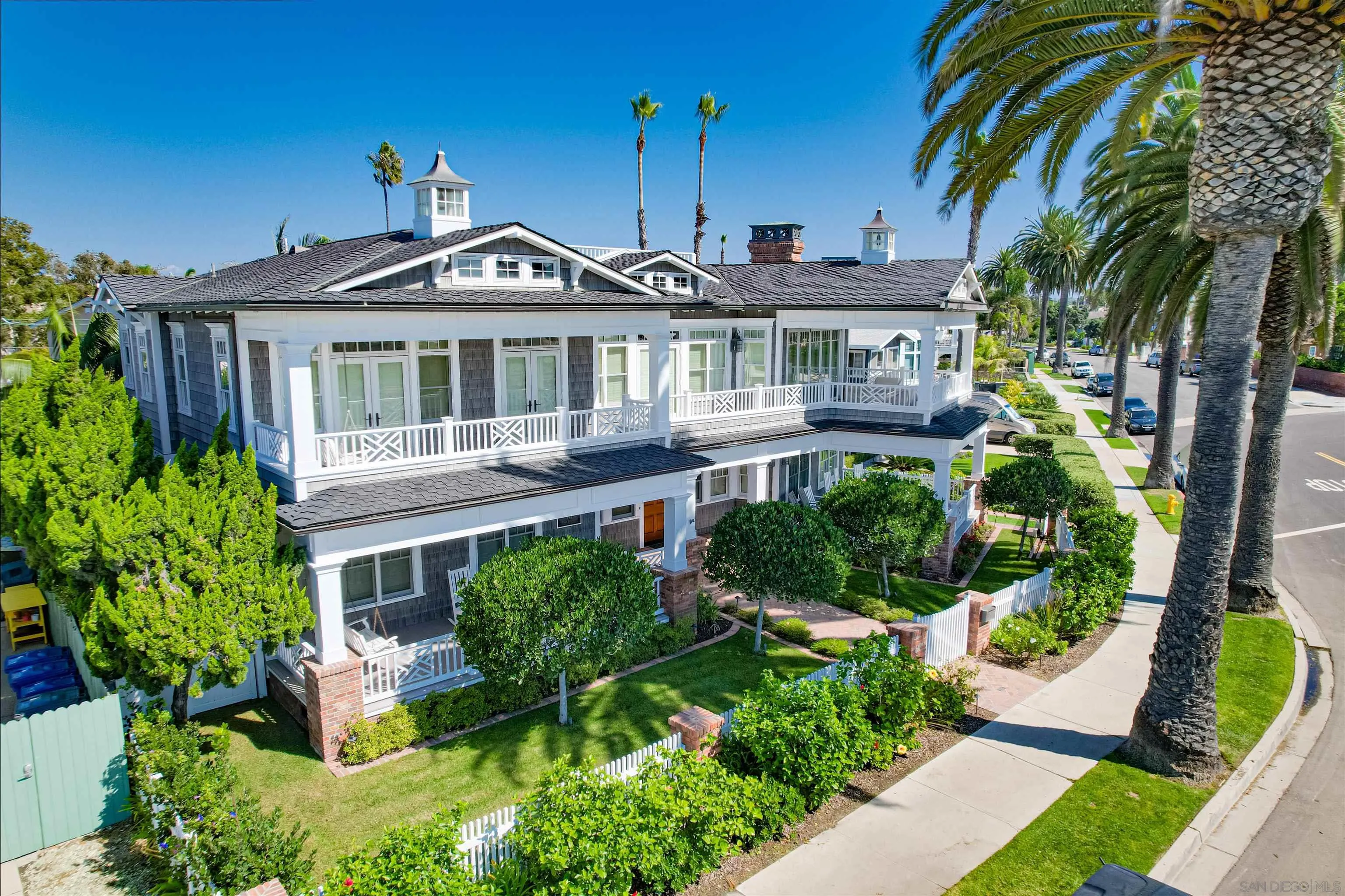 441 Ocean Boulevard Coronado, CA 92118 - Photo 3 of 40 a front view of a house with a garden