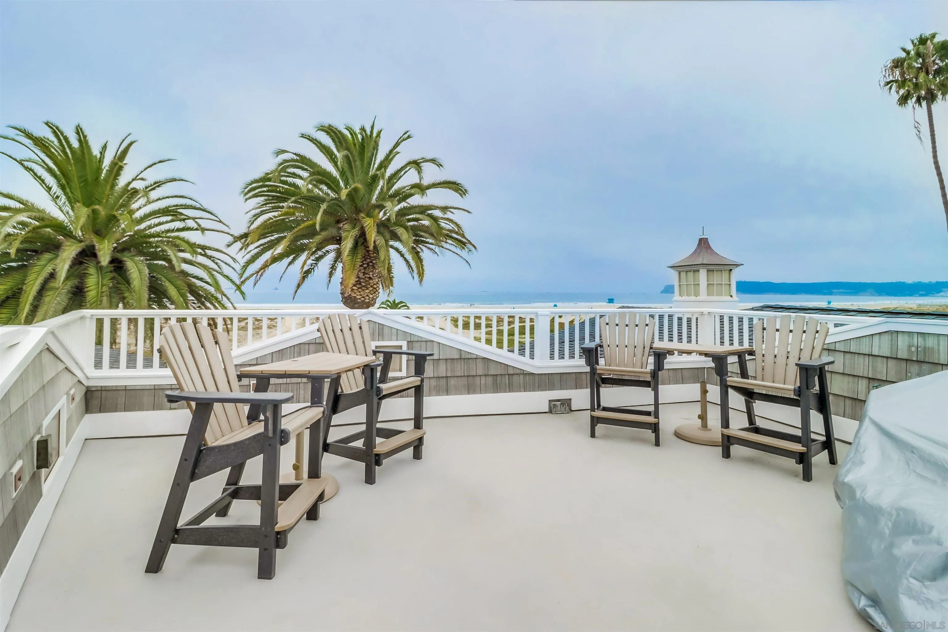 441 Ocean Boulevard Coronado, CA 92118 - Photo 34 of 40 a view of a chairs and table on the patio