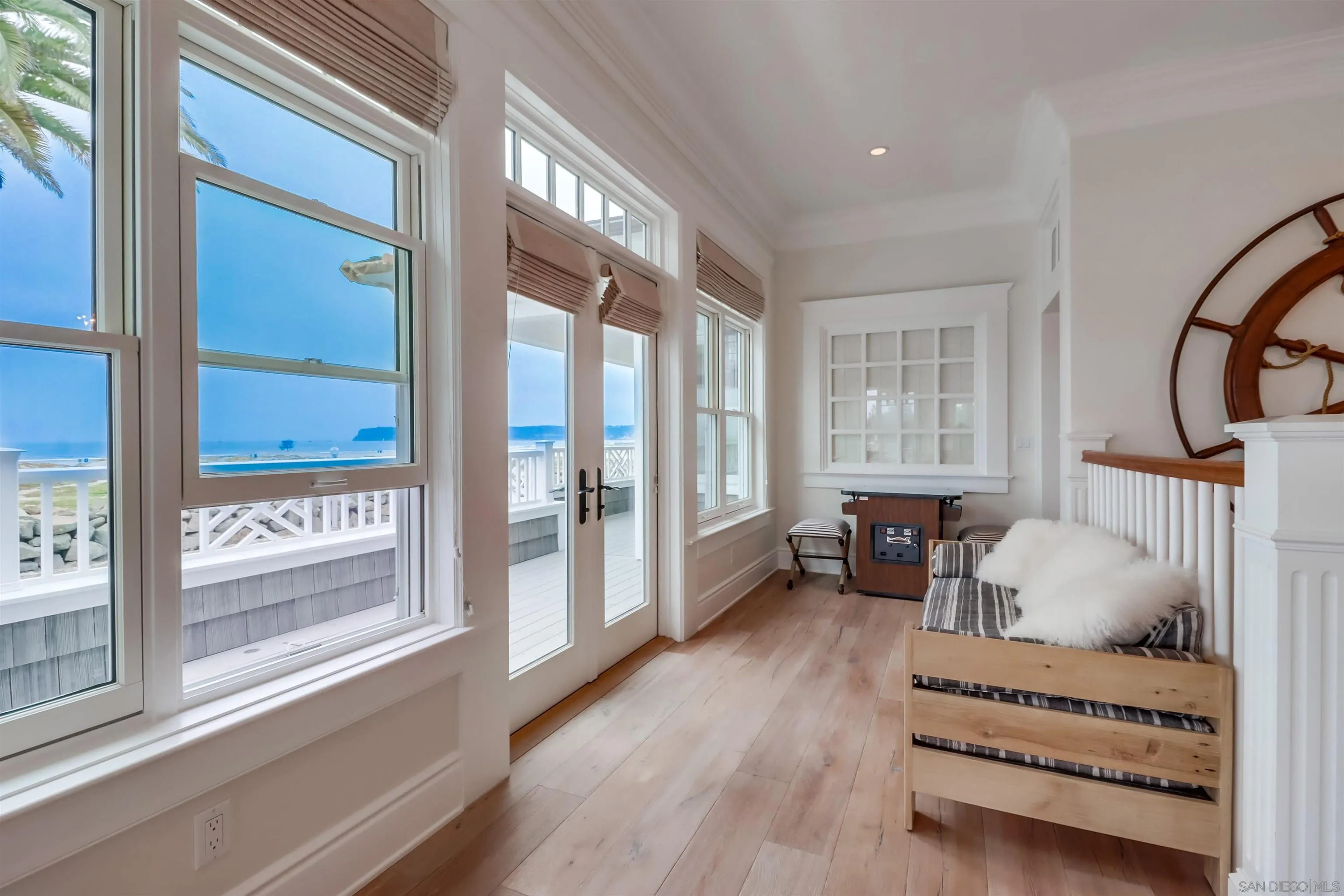 441 Ocean Boulevard Coronado, CA 92118 - Photo 6 of 40 a bedroom with furniture and a large window