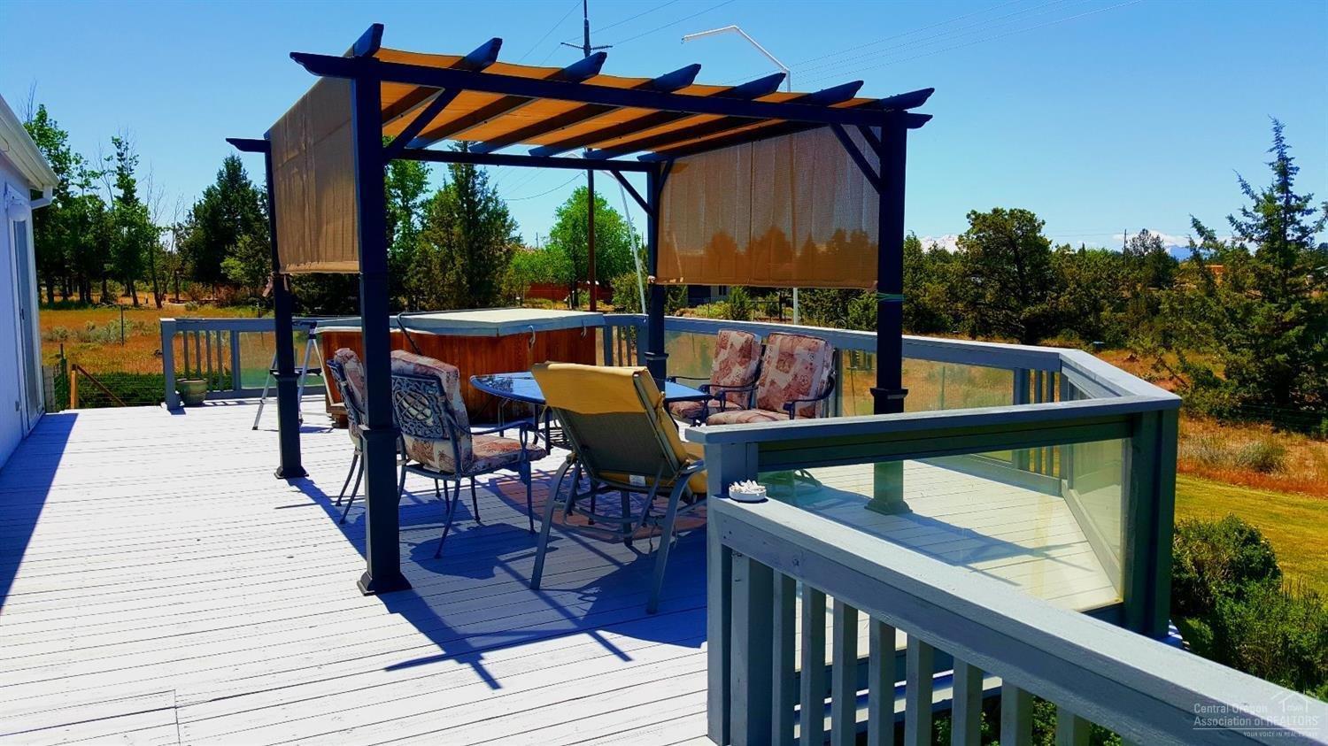 6208 Southwest Rim Road Terrebonne, OR 97760 - Photo 2 of 20 Pergola and hot tub are on the back deck