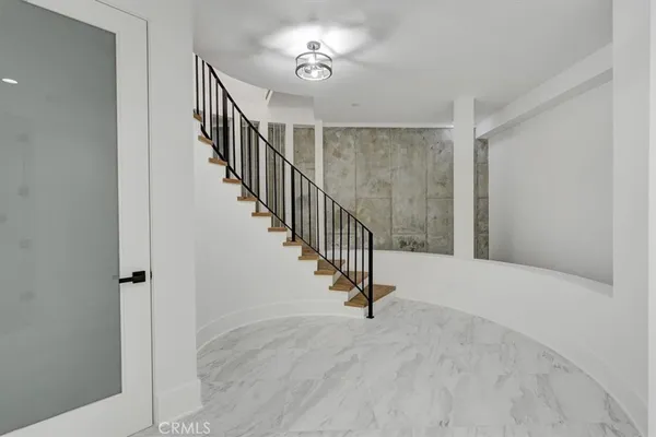 a view of an entryway with stairs