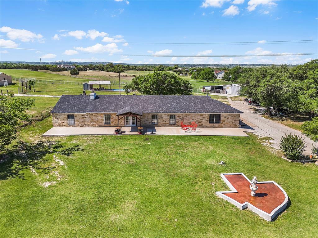 748 Rocky Ridge Lane Weatherford, TX 76085 - Photo 32 of 38 a view of a big room with table and chairs