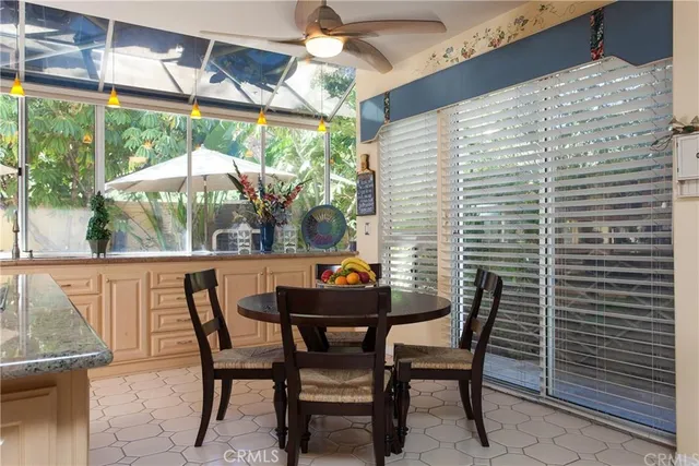 a outdoor dining space with furniture and outdoor view