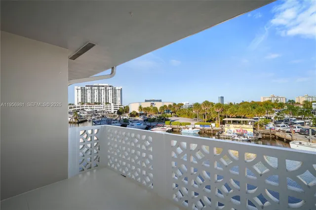 a view of a balcony with an ocean view