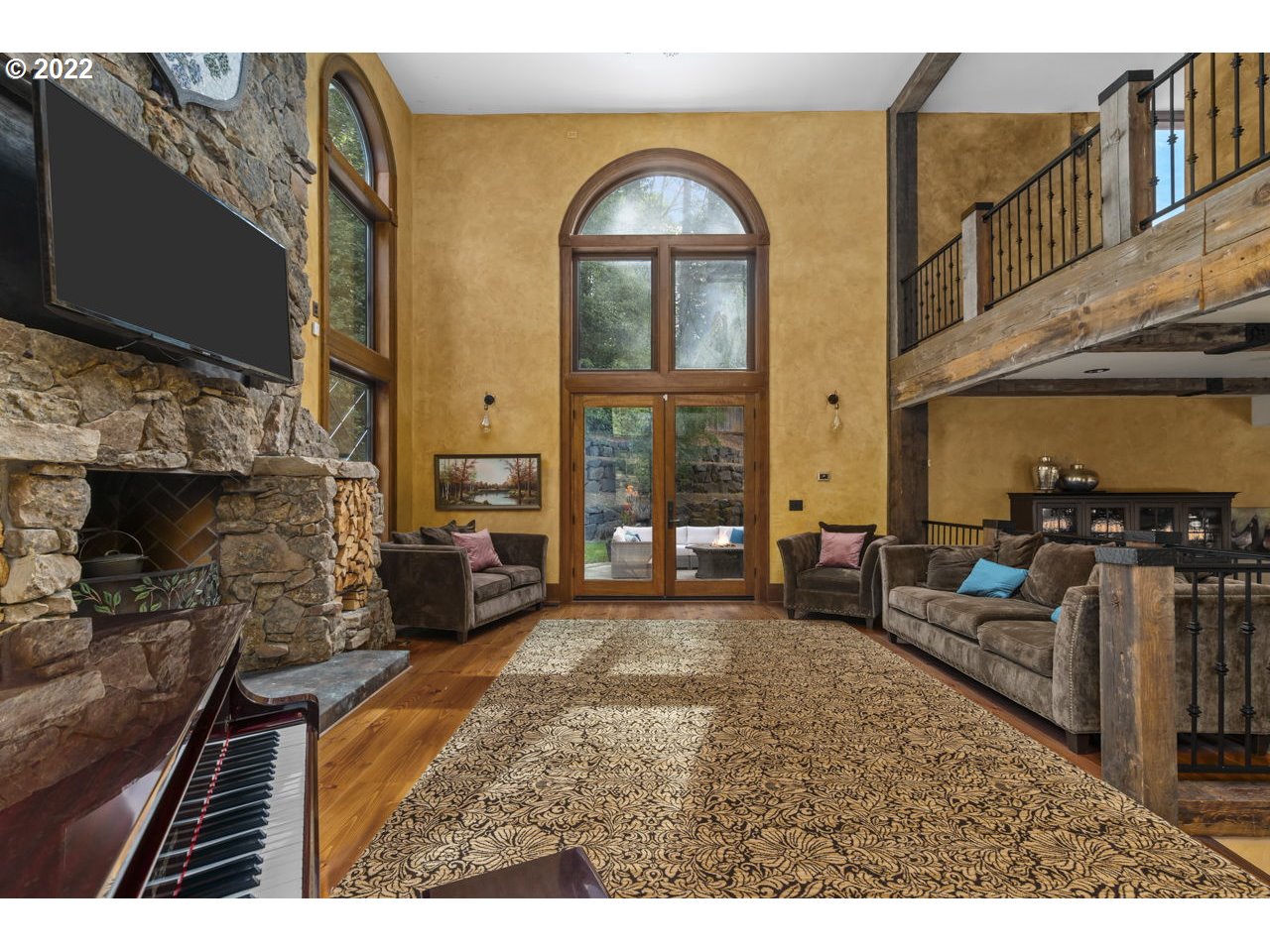 14125 Northwest Germantown Road Portland, OR 97231 - Photo 12 of 32 a view of a livingroom with furniture and a fireplace