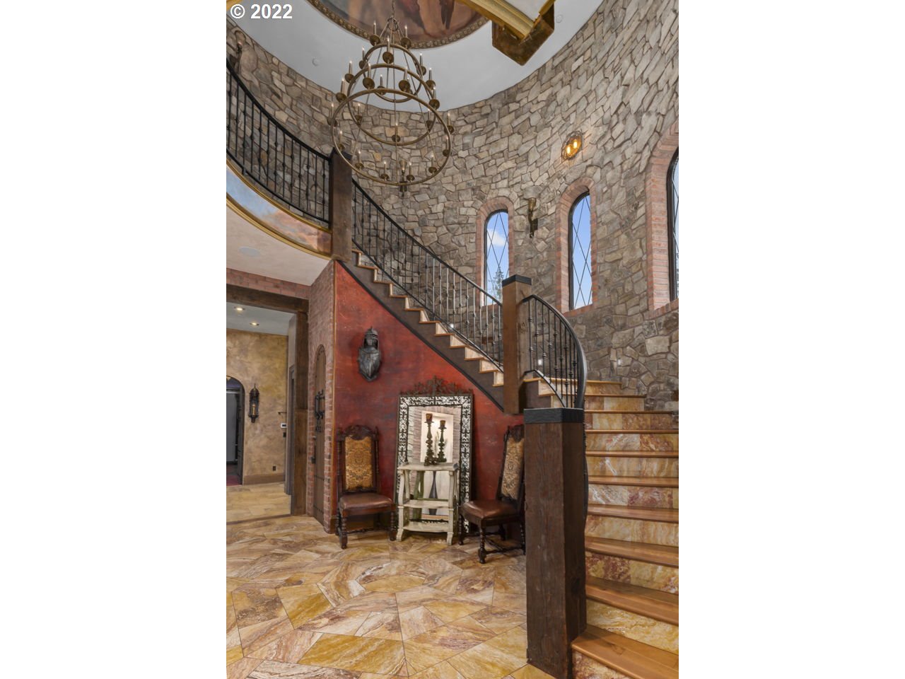 14125 Northwest Germantown Road Portland, OR 97231 - Photo 18 of 32 a view of a hallway with a chandelier