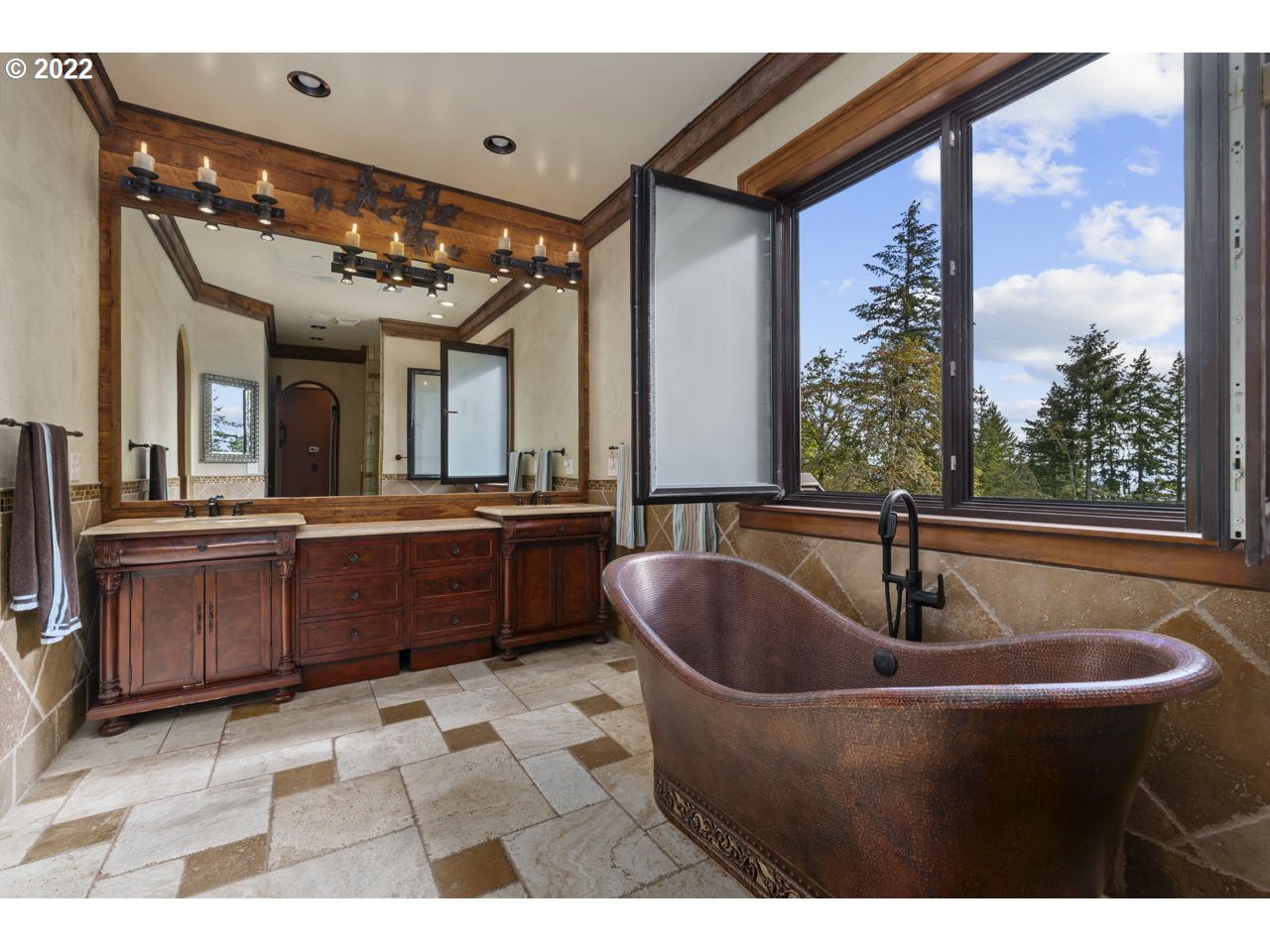 14125 Northwest Germantown Road Portland, OR 97231 - Photo 22 of 32 a dining room with a large window and chairs