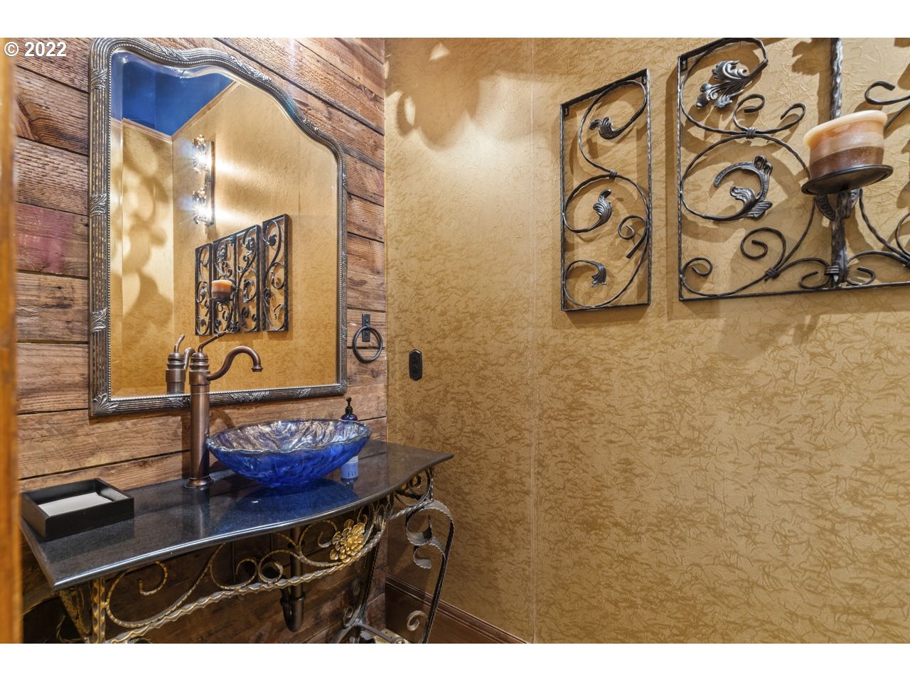 14125 Northwest Germantown Road Portland, OR 97231 - Photo 23 of 32 a bathroom with a sink and a mirror