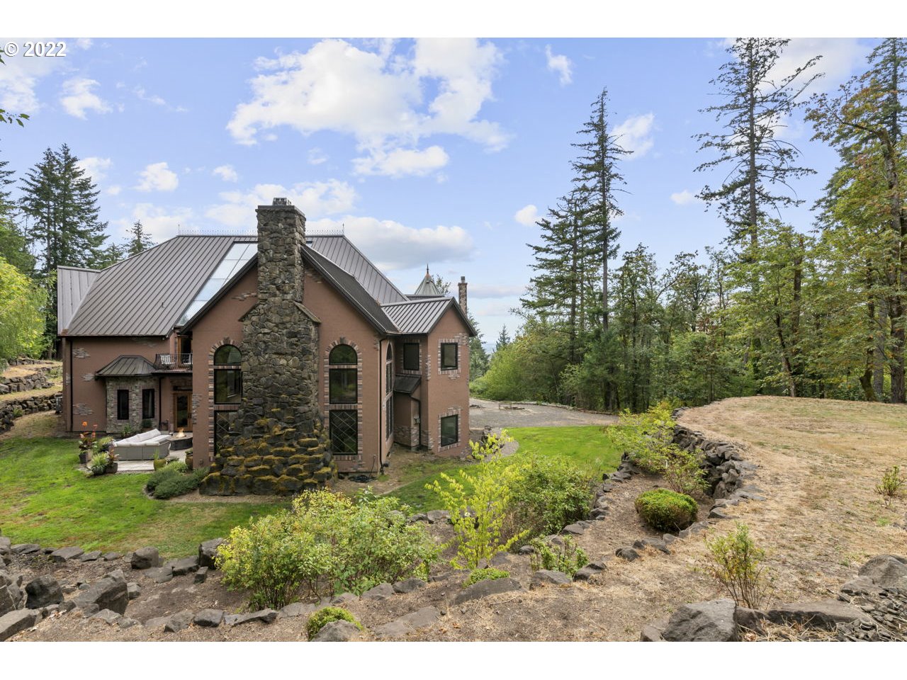 14125 Northwest Germantown Road Portland, OR 97231 - Photo 31 of 32 a view of a house with a yard and potted plants