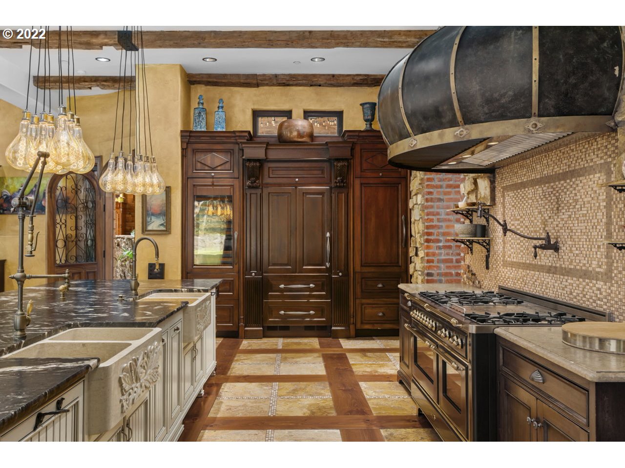 14125 Northwest Germantown Road Portland, OR 97231 - Photo 9 of 32 a kitchen that has a sink and a stove