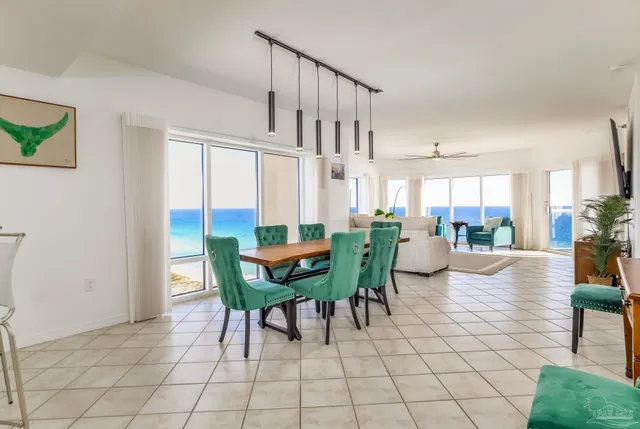 a view of a livingroom with furniture and a table