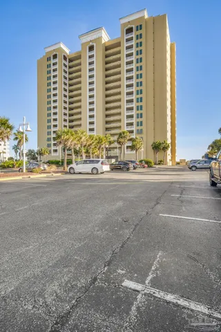 a front view of a building with a road