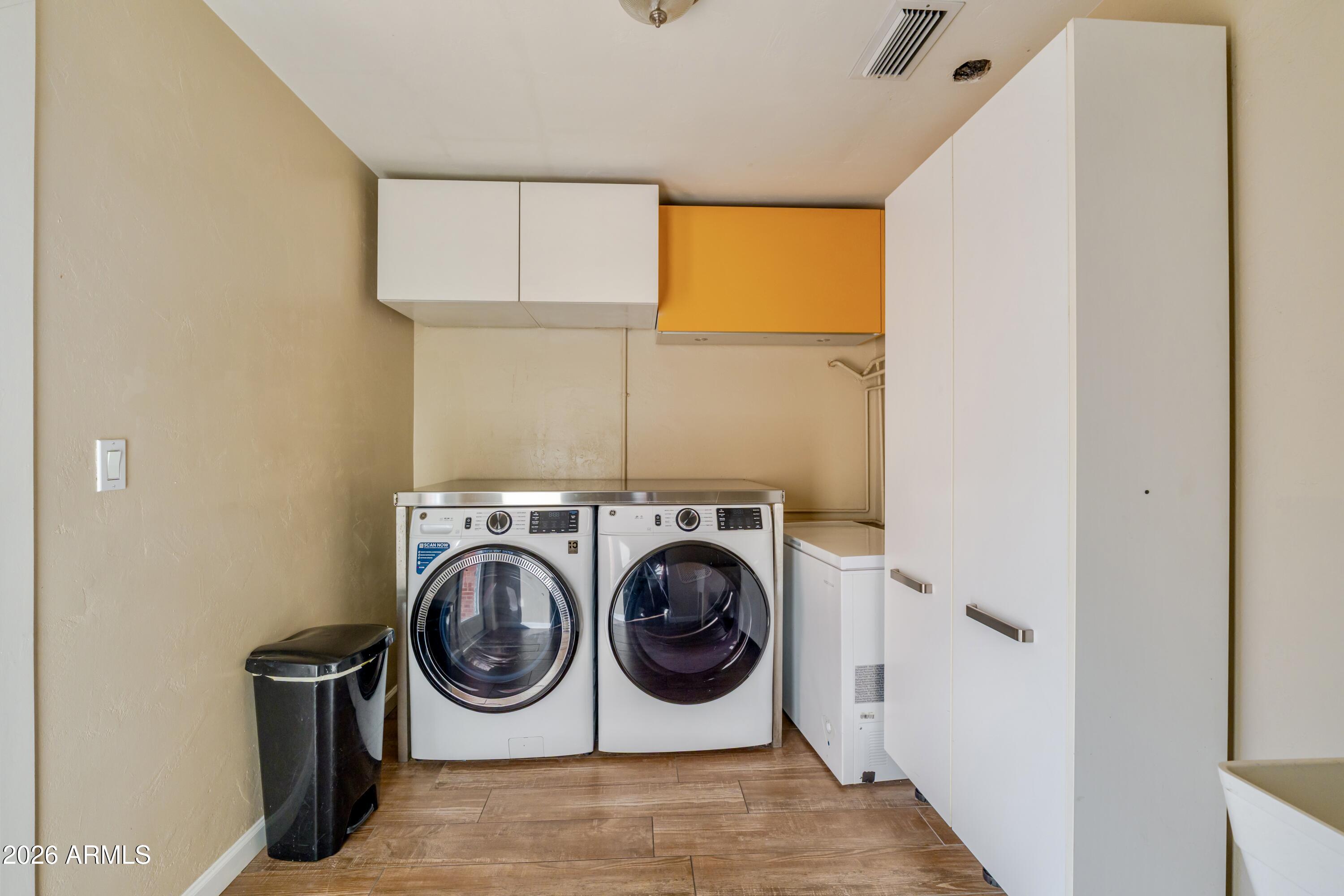 1631 West Rovey Avenue Phoenix, AZ 85015 - Photo 17 of 46 a utility room with sink dryer and washer