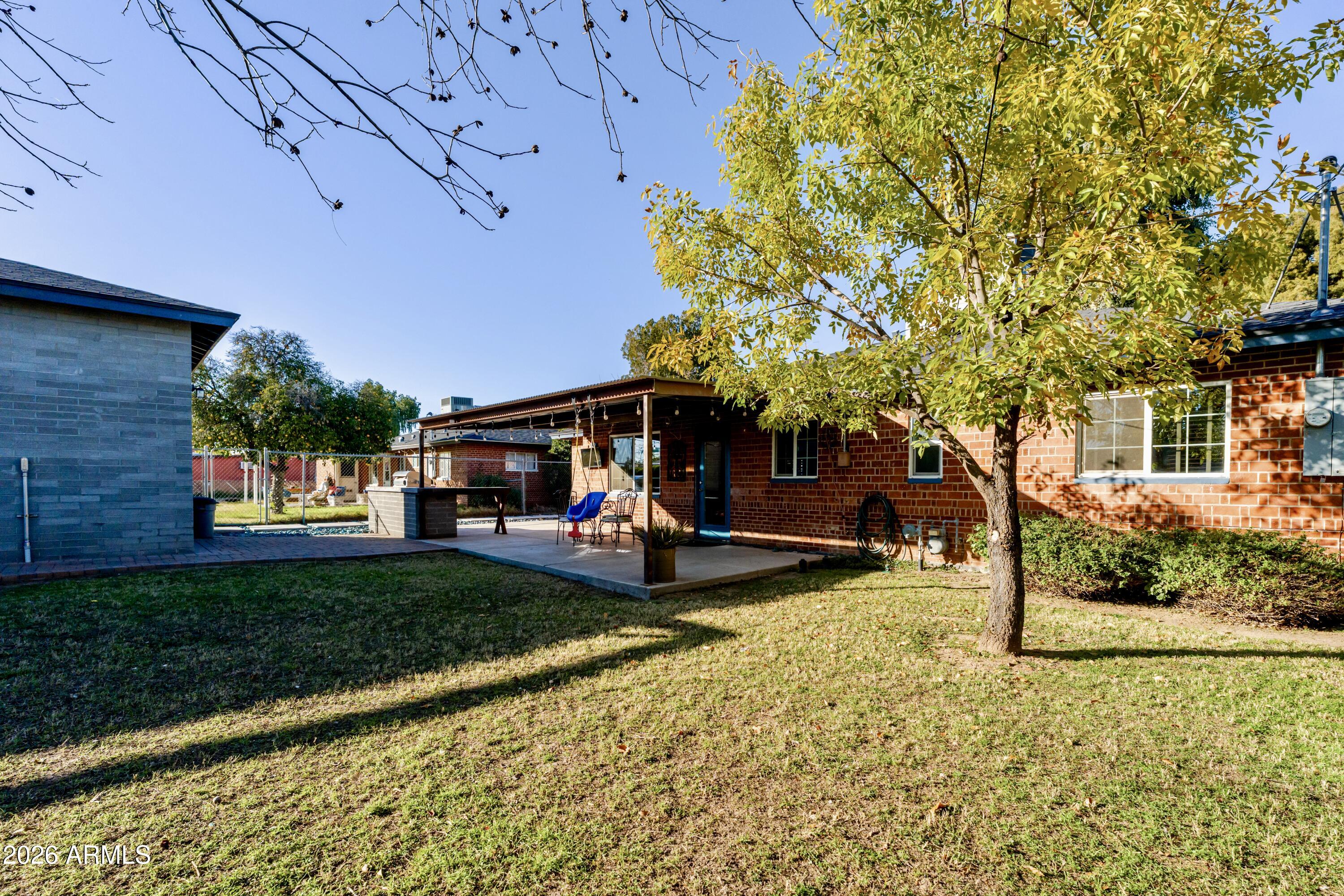 1631 West Rovey Avenue Phoenix, AZ 85015 - Photo 37 of 46 a view of a house with backyard and sitting area