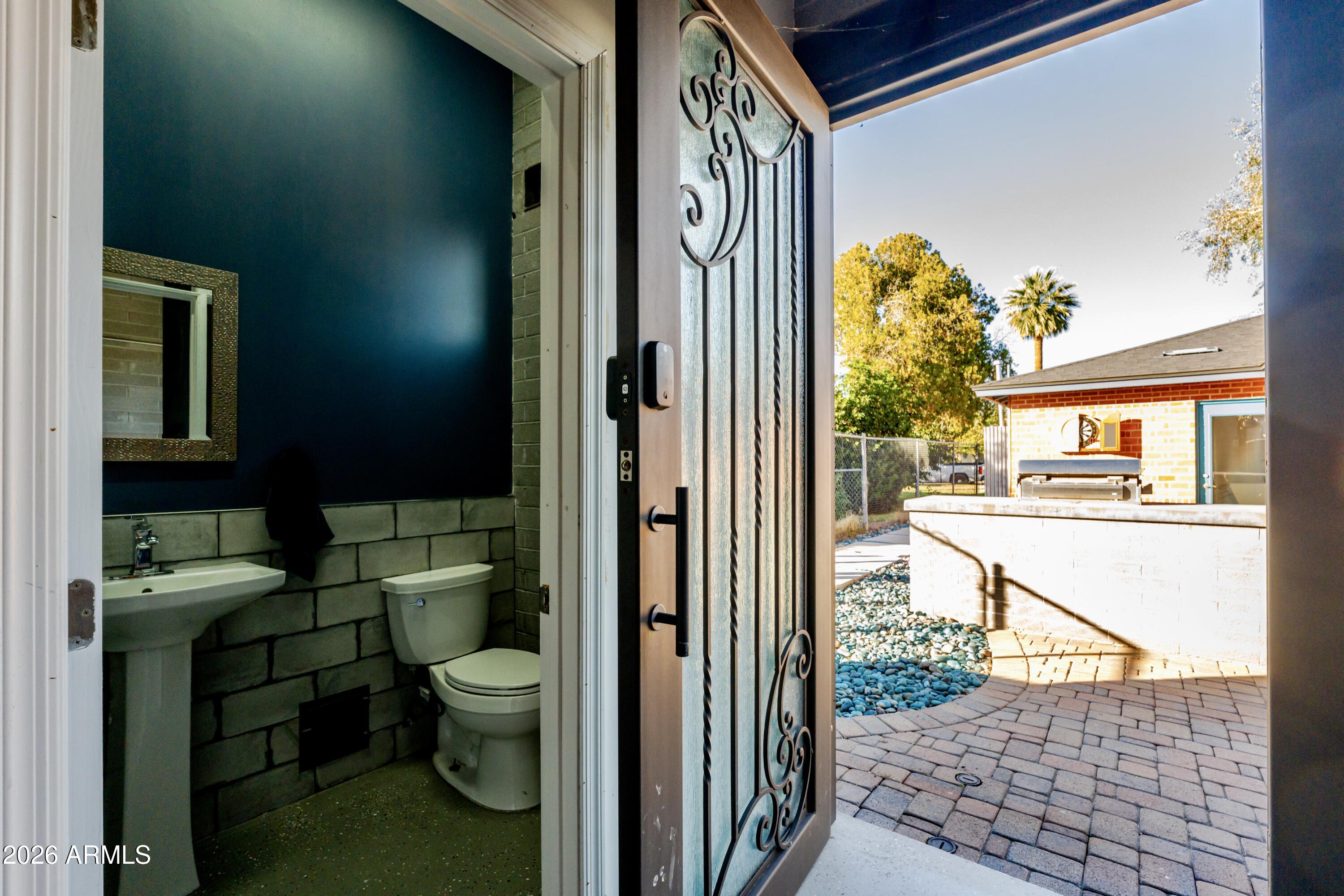 1631 West Rovey Avenue Phoenix, AZ 85015 - Photo 42 of 46 a view of a door and chair in the balcony