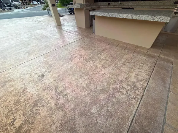 a dining room with furniture a large window and a chandelier