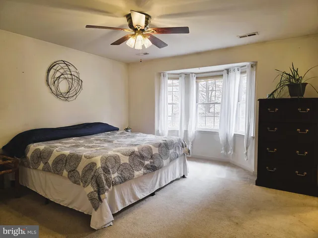 a bathroom with a bathtub sink and toilet