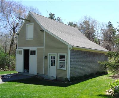 1 Piccadilly Road Sandwich, MA 02563 - Photo 13 of 13 a view of backyard with potted plants and large tree