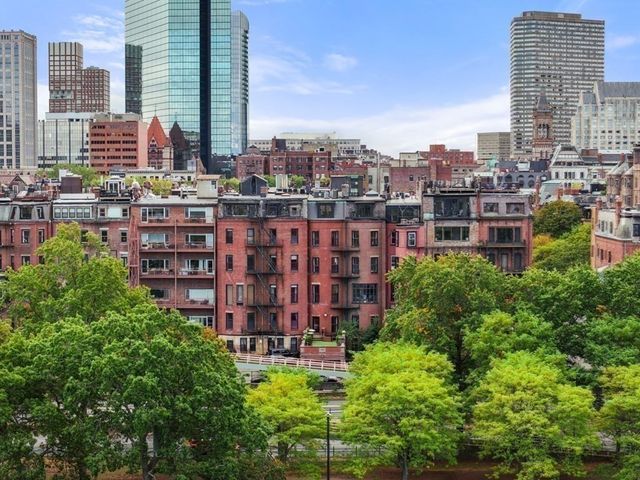 a view of a city with tall buildings