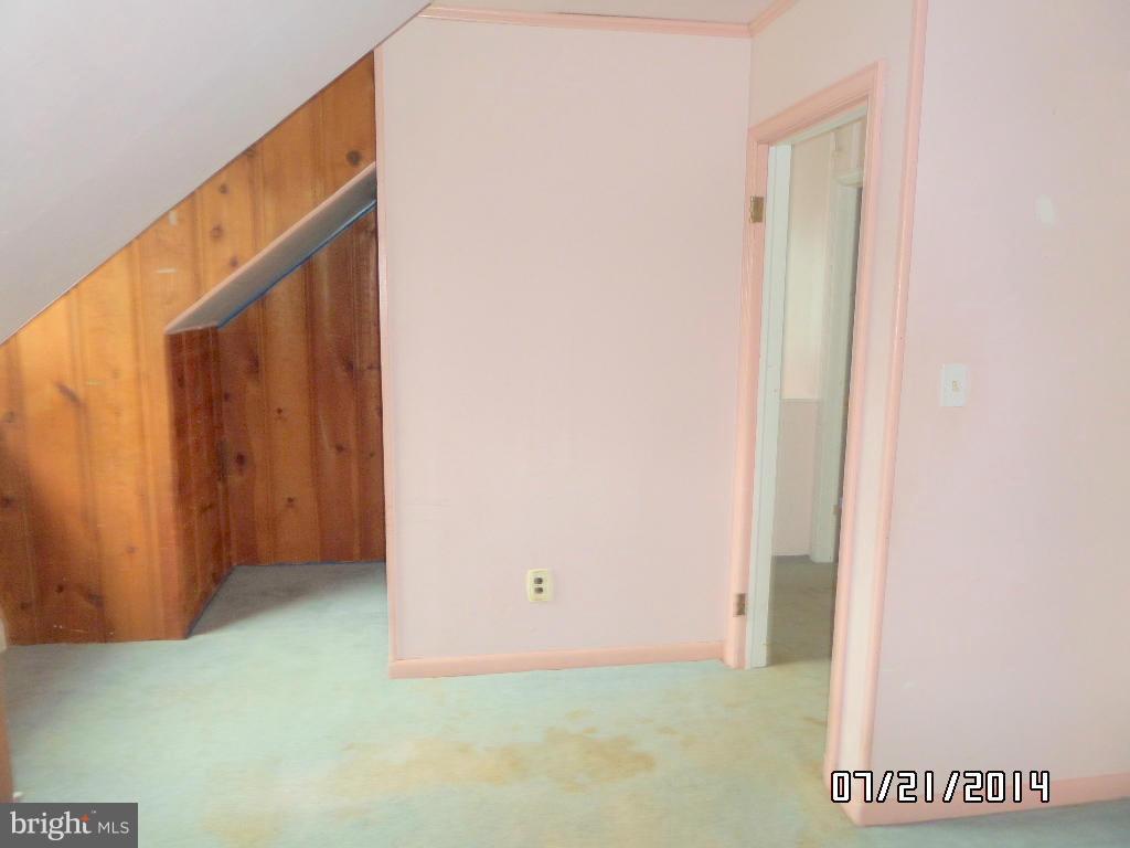608 Cliveden Road Baltimore, MD 21208 - Photo 15 of 23 a view of an empty room
