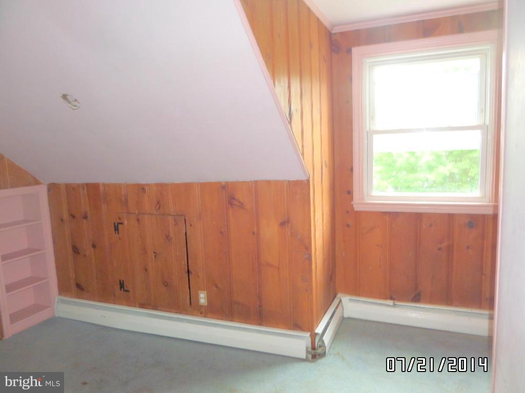 608 Cliveden Road Baltimore, MD 21208 - Photo 16 of 23 a view of an empty room and window